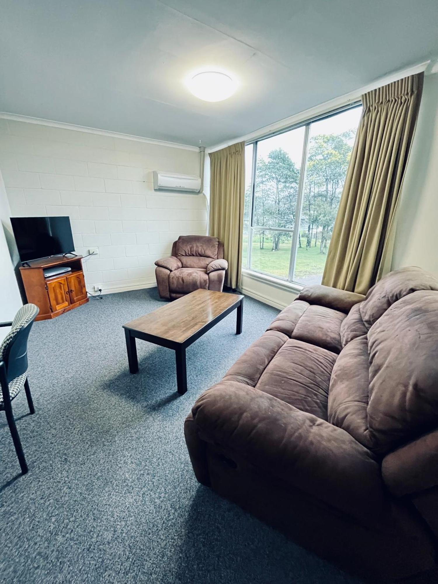 Heemskirk Motor Hotel Zeehan Quarto foto